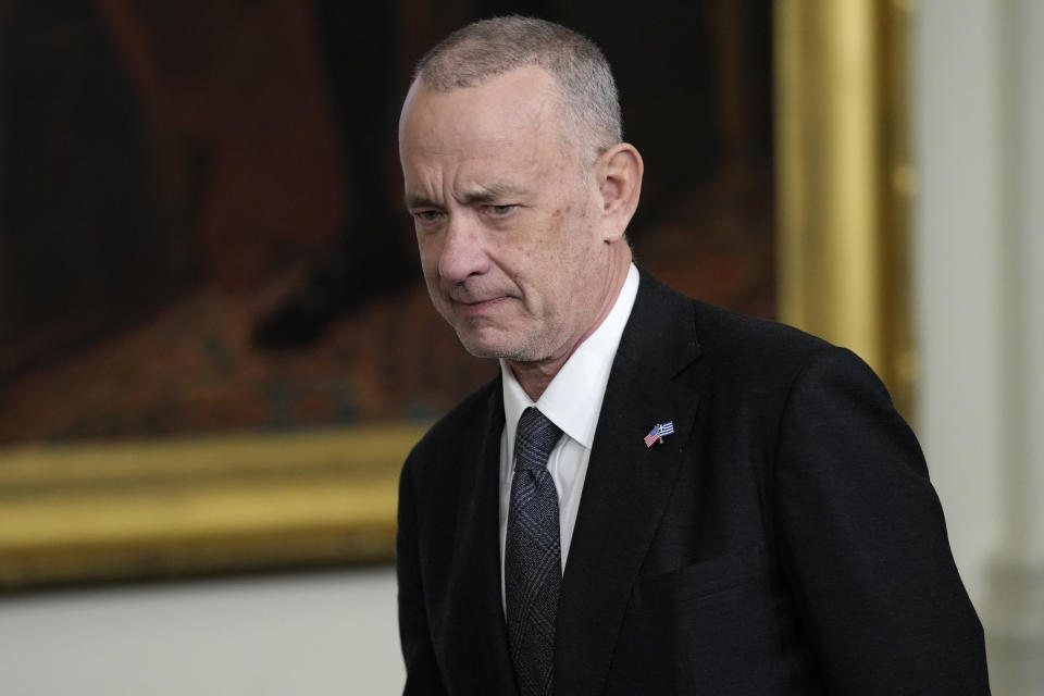 Actor Tom Hanks arrives before President Joe Biden speaks during a reception in the East Room of the White House in Washington, Wednesday, March 29, 2023, celebrating Greek Independence Day. (AP Photo/Susan Walsh)