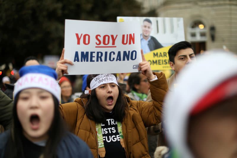 FILE PHOTO: People gather outside the U.S. Supreme Court during oral arguments in Trump administration’s bid to end the DACA program in Washington