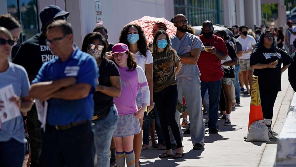 PHOTO: People wait in line at one of a few in-person voting places during a nearly all-mail primary election, June 9, 2020, in Las Vegas. (John Locher/AP)