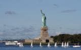 The 150ft high Lady Liberty stands tall in New York Harbor as a symbol of liberty and freedom to immigrants