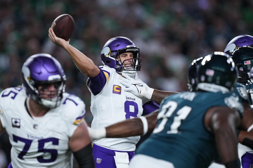 Minnesota Vikings quarterback Kirk Cousins (8) throws during the second half of an NFL football game against the Philadelphia Eagles on Thursday, Sept. 14, 2023, in Philadelphia. (AP Photo/Matt Rourke)