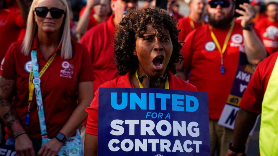 PHOTO: Phaedra Grant, who has worked 34 years for Ford, holds a sign during a United Auto Workers rally to support striking workers outside an assembly plant in Louisville, Kentucky, on Sept. 21, 2023. (Michael Swensen/Reuters)