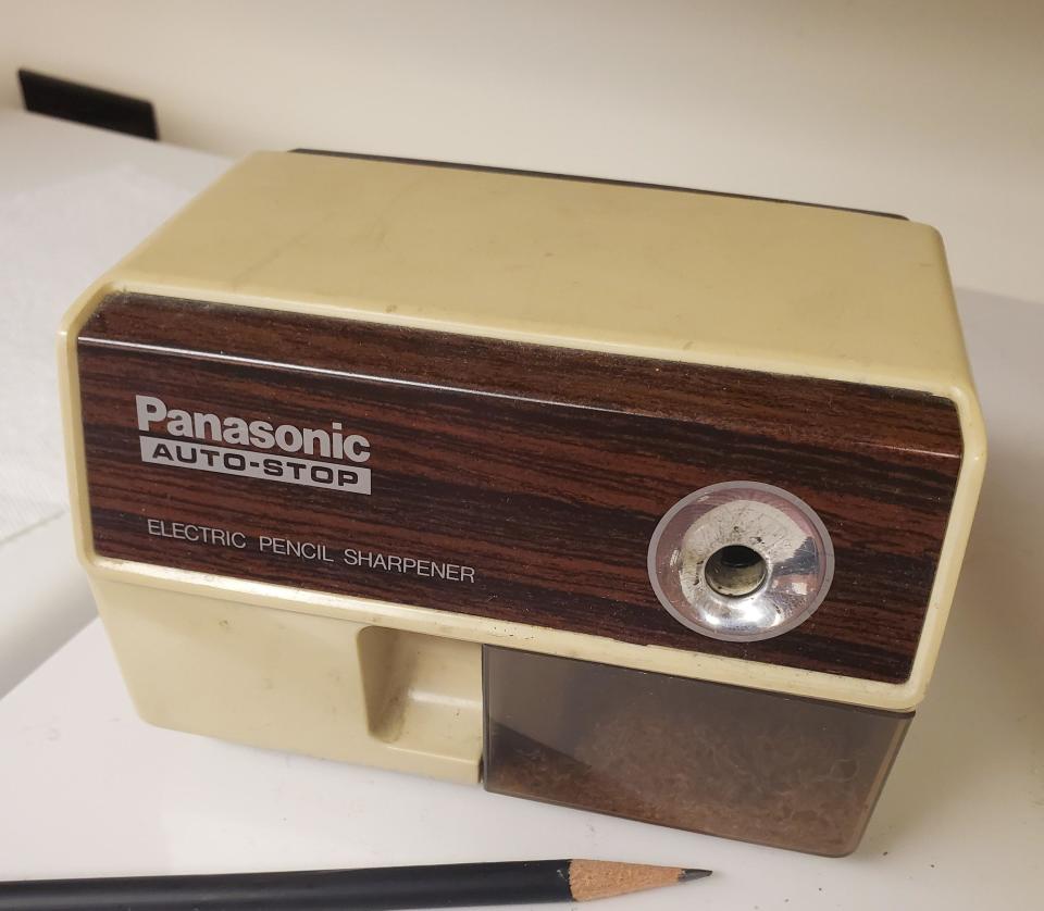 A Panasonic Auto-Stop Electric Pencil Sharpener