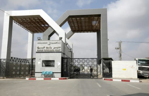 Security forces loyal to the Palestinian Authority stand at the Rafah border crossing with Egypt in the southern Gaza Strip on July 17, 2018