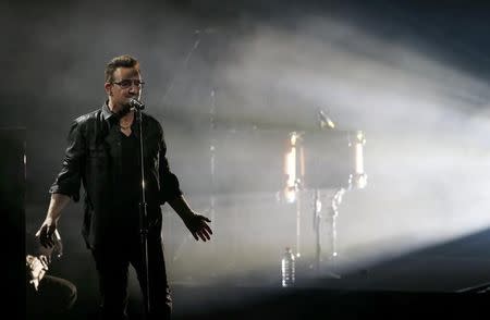 Bono, lead singer of the band U2, performs during the Bambi 2014 media awards ceremony in Berlin November 13, 2014. The annual Bambi awards honours celebrities from the world of entertainment, literature, sports and politics. REUTERS/Fabrizio Bensch