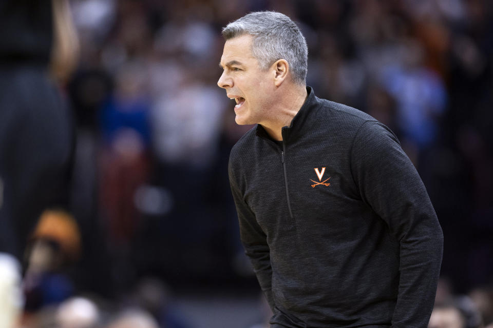 Virginia head coach Tony Bennett yells to his players during the first half of an NCAA college basketball game against Wake Forest, Saturday, Feb. 17, 2024 in Charlottesville, Va. (AP Photo/Mike Kropf)