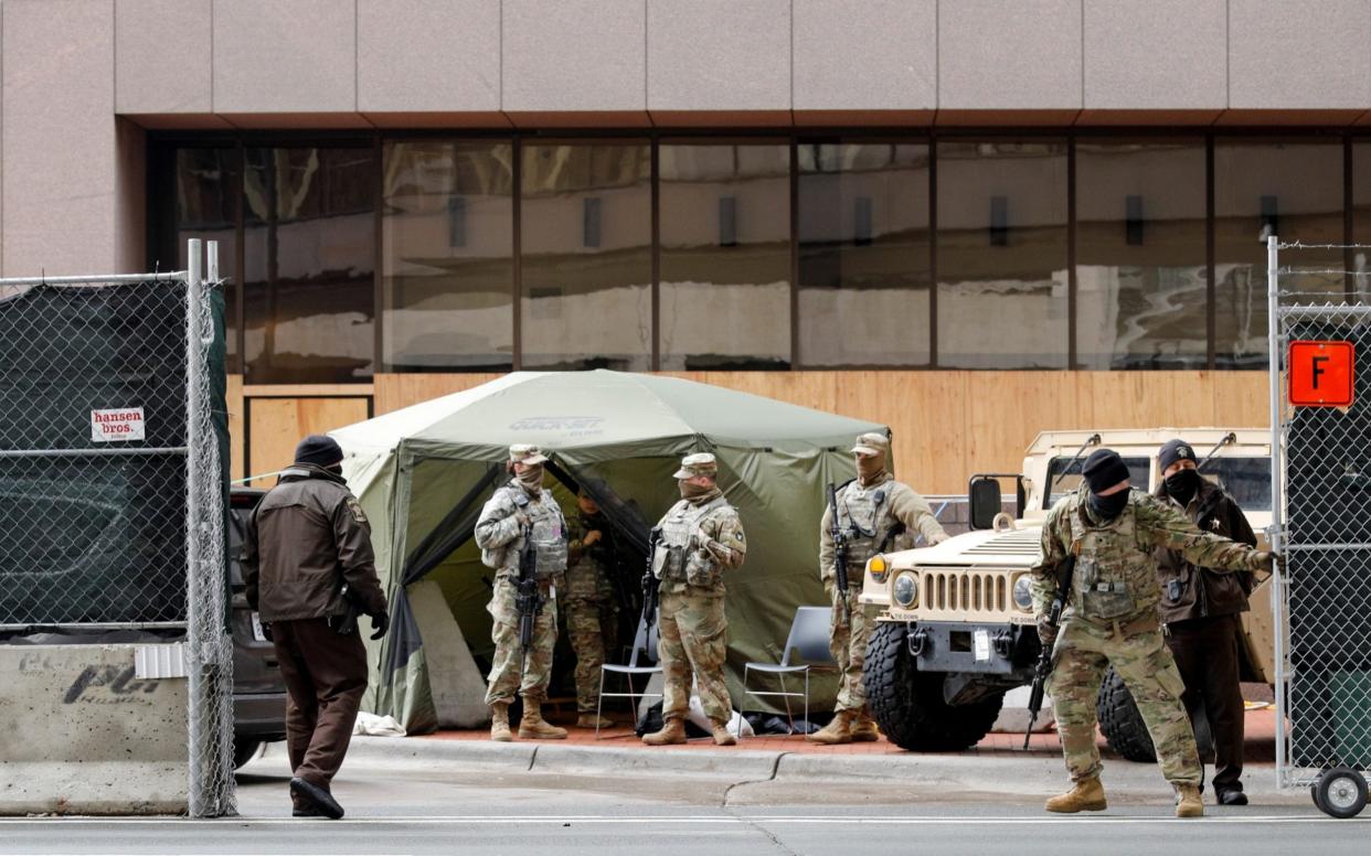 The Hennepin County courthouse looks more like a military base than a the heart of local government - Nicholas Pfosi/Reuters