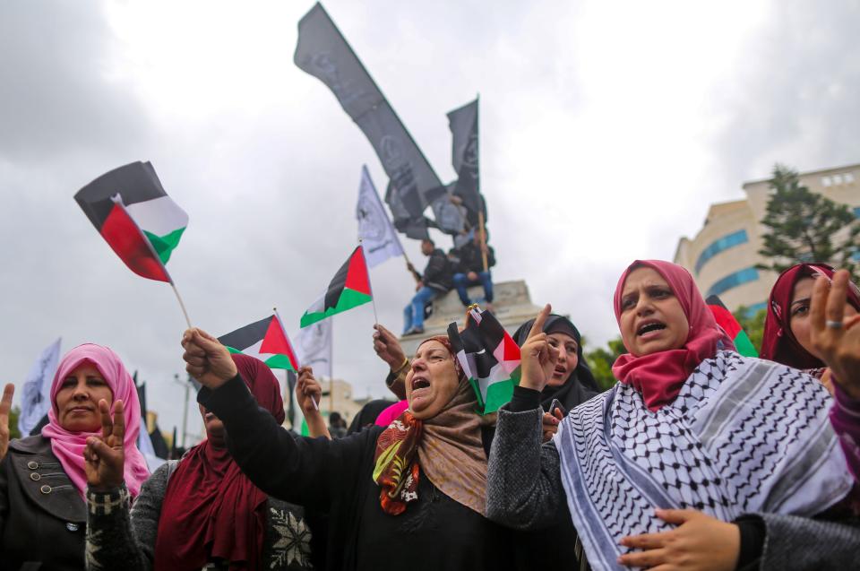 Palestinian women shout slogans during a protest in Gaza City on December 6, 2017.&nbsp;