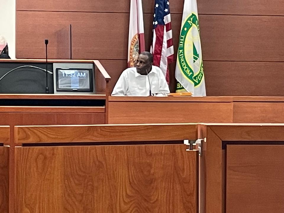 Allison K. Mells testifying at his trial.