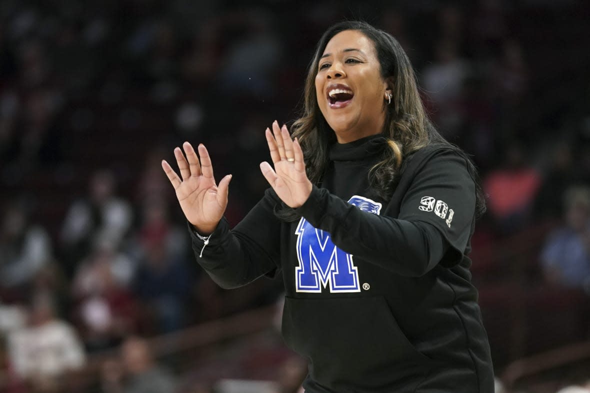 Memphis head coach Katrina Merriweather communicates with players during the first half of an NCAA college basketball game against South Carolina Saturday, Dec. 3, 2022, in Columbia, S.C. Cincinnati hired former Memphis coach Katrina Merriweather as its new women’s basketball coach Saturday, March 25, 2023. (AP Photo/Sean Rayford, File)