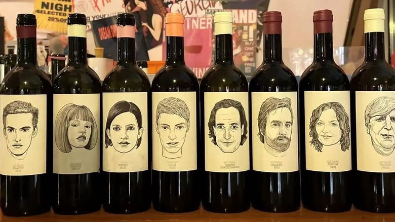 wine bottles with face drawings