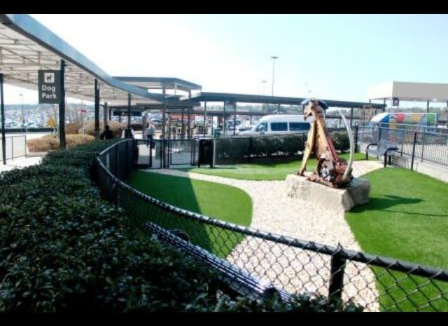 Airport amenities aren’t only about catering to humans; luxuries have extended to their furry four-legged companions as well. All airports are required to have a place for dogs to relieve themselves before a flight but Atlanta has taken it to the next level, providing three areas—one of which is a park. The 1,000-square-foot, fully fenced in dog park is lovely, complete with two giant dog-themed pieces of art and benches. Added bonus: they provide biodegradable waste bags.     <em>Photo Credit: Atlanta-airport.com</a></em>  