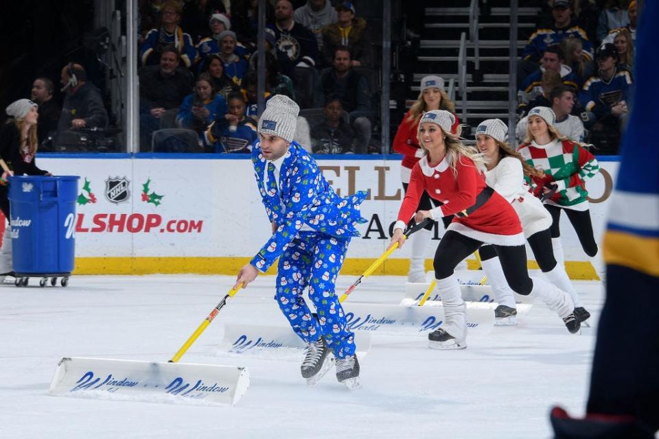 St. Louis Blues ice crew in Christmas attire