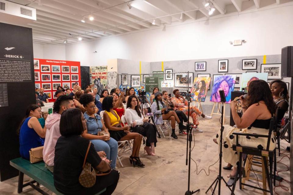 A crowd listens to a panel of female Miami radio legends Supa Cindy, Stichiz and Lucy Lopez at The Art of Hip Hop in Wynwood in celebration of Women’s History Month. World Red Eye/Courtesy of The Art of Hip Hop