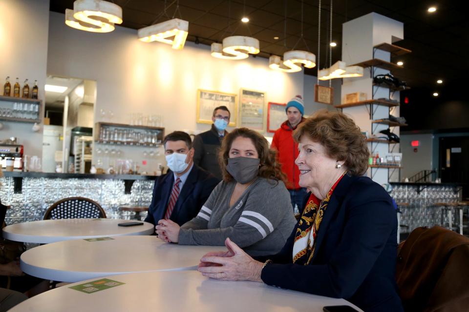 Sen. Jeanne Shaheen, D-New Hampshire, right, chats with Sassy Biscuit Co. director of operations Britnie Lia, to her right, at the Dover restaurant Tuesday, Nov. 23, 2021, along with Mike Vlacich, administrator for the Small Business Administration of New England.