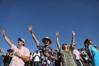 Christian pilgrims and tourists react during a religious retreat lead by T.B. Joshua, a Nigerian evangelical preacher on Mount Precipice, Nazareth