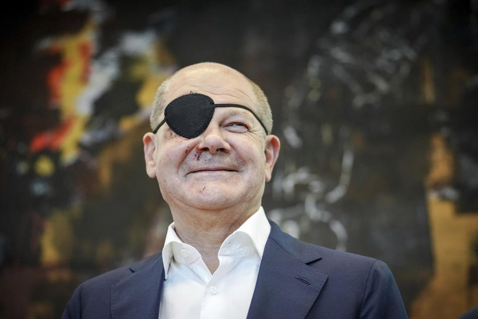 German Chancellor and member of the German Social Democratic Party (SPD), Olaf Scholz, attends his party's federal parliamentary group meeting at the Reichstag building, home of the German federal parliament, Bundestag, in Germany, Monday, Sept. 4, 2023. German Chancellor Olaf Scholz has tweeted a pirate-style picture of himself with a black eye patch and dark-red bruises on the right side of his face — the result of a jogging accident on the weekend. The chancellor wrote Monday in the caption of the photo that he was “excited to see the memes.” (Kay Nietfeld/dpa via AP)