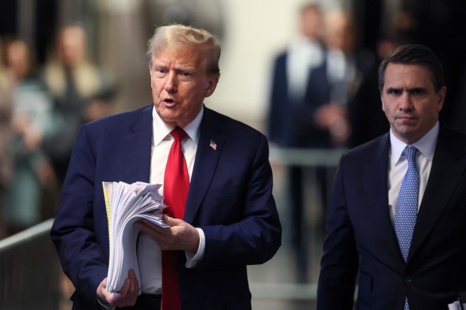 Trump speaking to the media outside court during the second day of the trial. Brendan McDermid-Pool/Getty Images