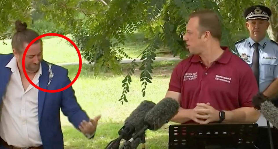 Deputy Premier Steven Miles looks on in disbelief at Mikey Webb during the press conference. Source: Nine