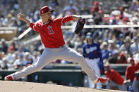 FILE - Then-Los Angeles Angels relief pitcher Hansel Robles works against a Los Angeles Dodgers batter during the third inning of a spring training baseball game in Glendale, Ariz., in this Wednesday, Feb. 26, 2020, file photo. The Minnesota Twins signed Alex Colomé away from their chief divisional competition, the Chicago White Sox, to bring in a proven closer to the back of the bullpen. The Twins won't formally assign that role, though, with Taylor Rogers, Hansel Robles and Tyler Duffey all in position for ninth-inning outs. (AP Photo/Gregory Bull, File)