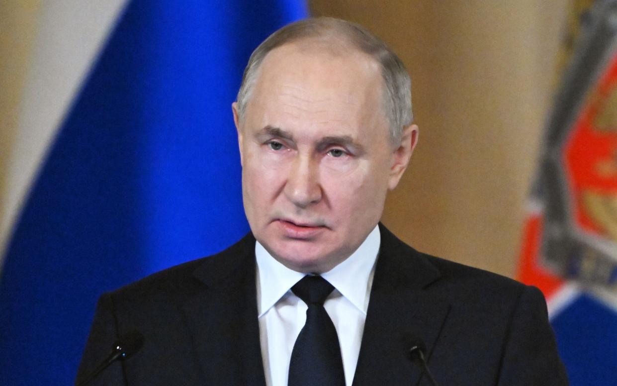 Russian President Vladimir Putin speaks during a meeting of the Federal Security Service