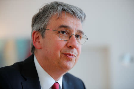 FILE PHOTO - Andreas Mundt, president of Germany's Federal Cartel Office, is pictured during an interview with Reuters in Bonn, Germany April 17, 2018. REUTERS/Wolfgang Rattay