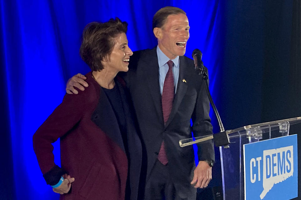 U.S. Sen. Richard Blumenthal, D-Conn., and his wife, Cynthia, celebrate his re-election, Tuesday, Nov. 8, 2022, in Hartford, Conn. (AP Photo/David Collins)