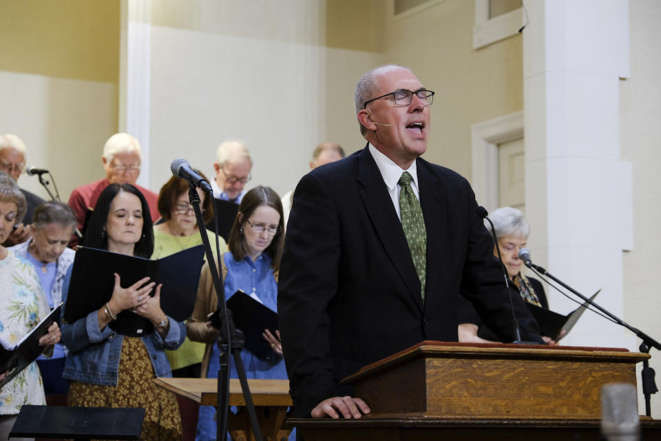 Pastor Bart Barber prays before service at the First Baptist Church of Farmersville, Texas, on Sunday, Sept. 25, 2022. In running for Southern Baptist Convention president, he expressed a desire to be a peacemaker and a unifier. (AP Photo/Audrey Jackson)