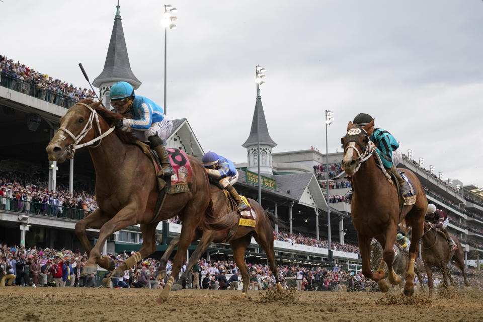 Mage (8), with Javier Castellano aboard, wins the 149th running of the Kentucky Derby horse race at Churchill Downs Saturday, May 6, 2023, in Louisville, Ky. (AP Photo/Jeff Roberson)