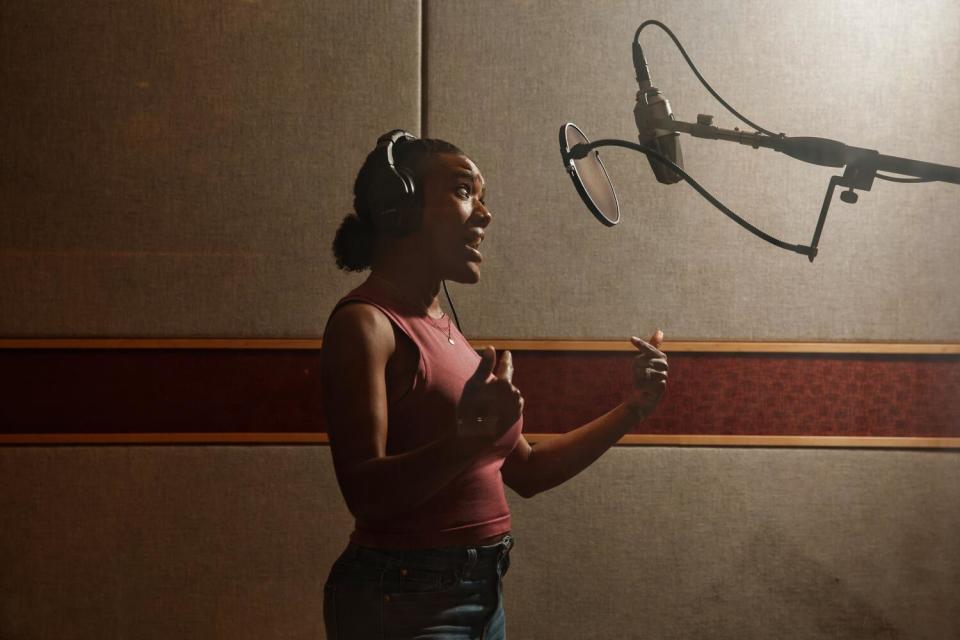 Voice actor Queen Noveen runs through a few scripts at Dave and Dave Recording Studios