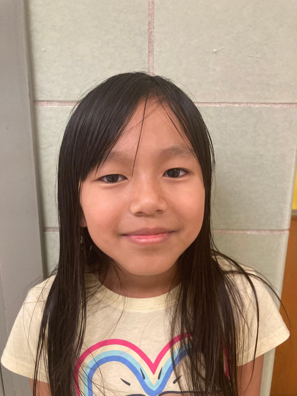 Third grader Khyei Thang won first place in the 2022 Dr. Martin Luther King, Jr. Writing Contest. "To me, a world of peace has kindness and people respecting each other," she wrote.