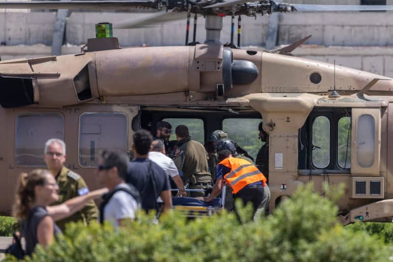 A helicopter carrying the rescued Israeli hostages kidnapped by Hamas from the Nova music festival on October 7 arrives at the Sheba Medical Center in Ramat Gan.  The Israeli Defense Forces (IDF) said on Saturday it had rescued four Israeli hostages "complex special day service" in Nuseirat, a refugee camp in the central Gaza Strip.  Ilia Yefimovich/dpa