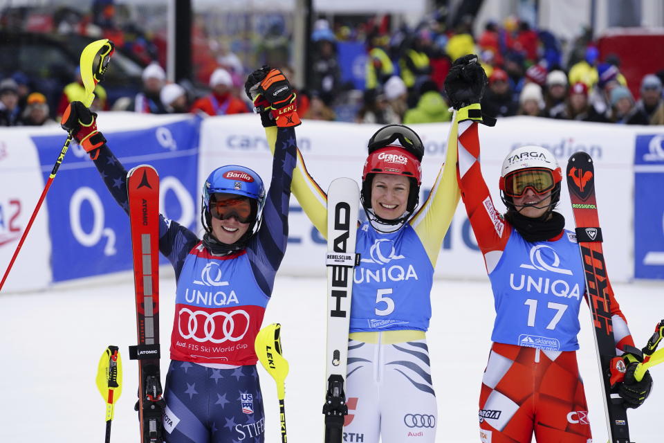 From left, second placed United States' Mikaela Shiffrin, the winner Germany's Lena Duerr and third placed Croatia's Zrinka Ljutic celebrate after completing an alpine ski, women's World Cup slalom, in Spindleruv Mlyn, Czech Republic, Sunday, Jan. 29, 2023. (AP Photo/Piermarco Tacca)