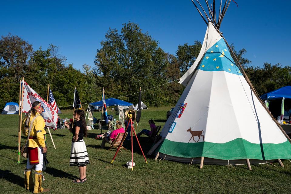 Darlene Franklin-Campbell talks with attendees of the Richmond, Ky., Pow Wow on Sept. 23, 2023. The event mainly operates as an educational experience for attendees and also serves as a gathering place for people who belong to different tribes that live in the area.