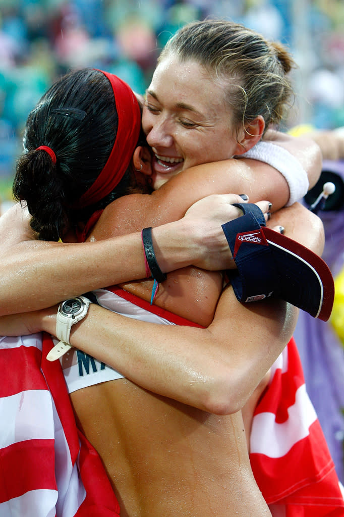 Gold medalists Kerri Walsh and Misty May-Treanor of the United States celebrate after winning the women's gold medal match against China held at the Chaoyang Park Beach Volleyball Ground during Day 13 of the Beijing 2008 Olympic Games on August 21, 2008 in Beijing, China.