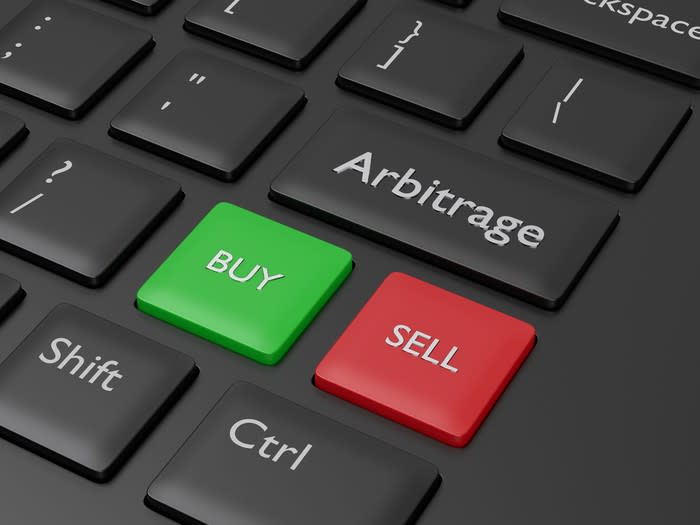 Buy, Sell, and Arbitrage buttons on a keyboard