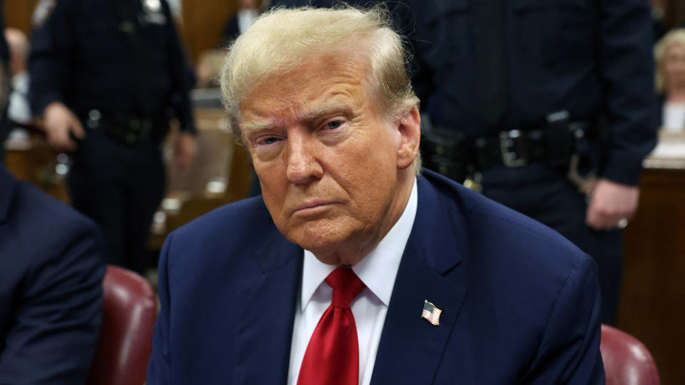 NEW YORK, NEW YORK - APRIL 25: Donald Trump sits in a Manhattan Criminal Courtroom with members of his legal team for the continuation of his hush money trial on April 25, 2024 in New York City. Former U.S. President Donald Trump faces 34 felony counts of falsifying business records in the first of his criminal cases to go to trial.      Spencer Platt/Pool via REUTERS