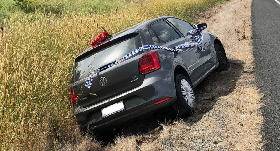 Car in roadside ditch after drunk driver crashed.