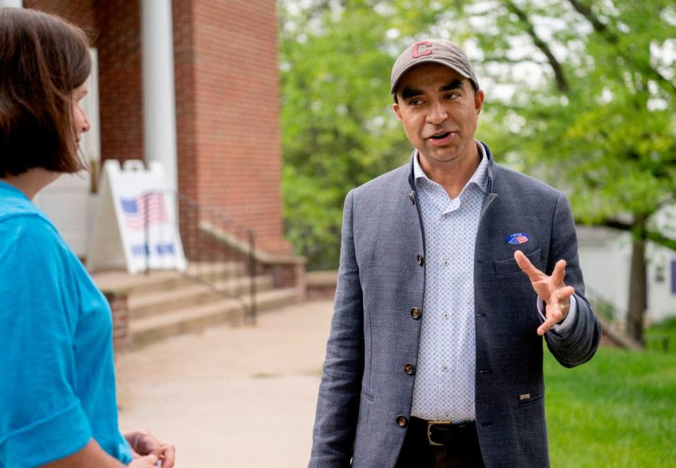 Candidate for judge Gopal Balachandran chats with people outside of the Church of Christ in State College during the primary election on Tuesday, May 16, 2023. Abby Drey/adrey@centredaily.com