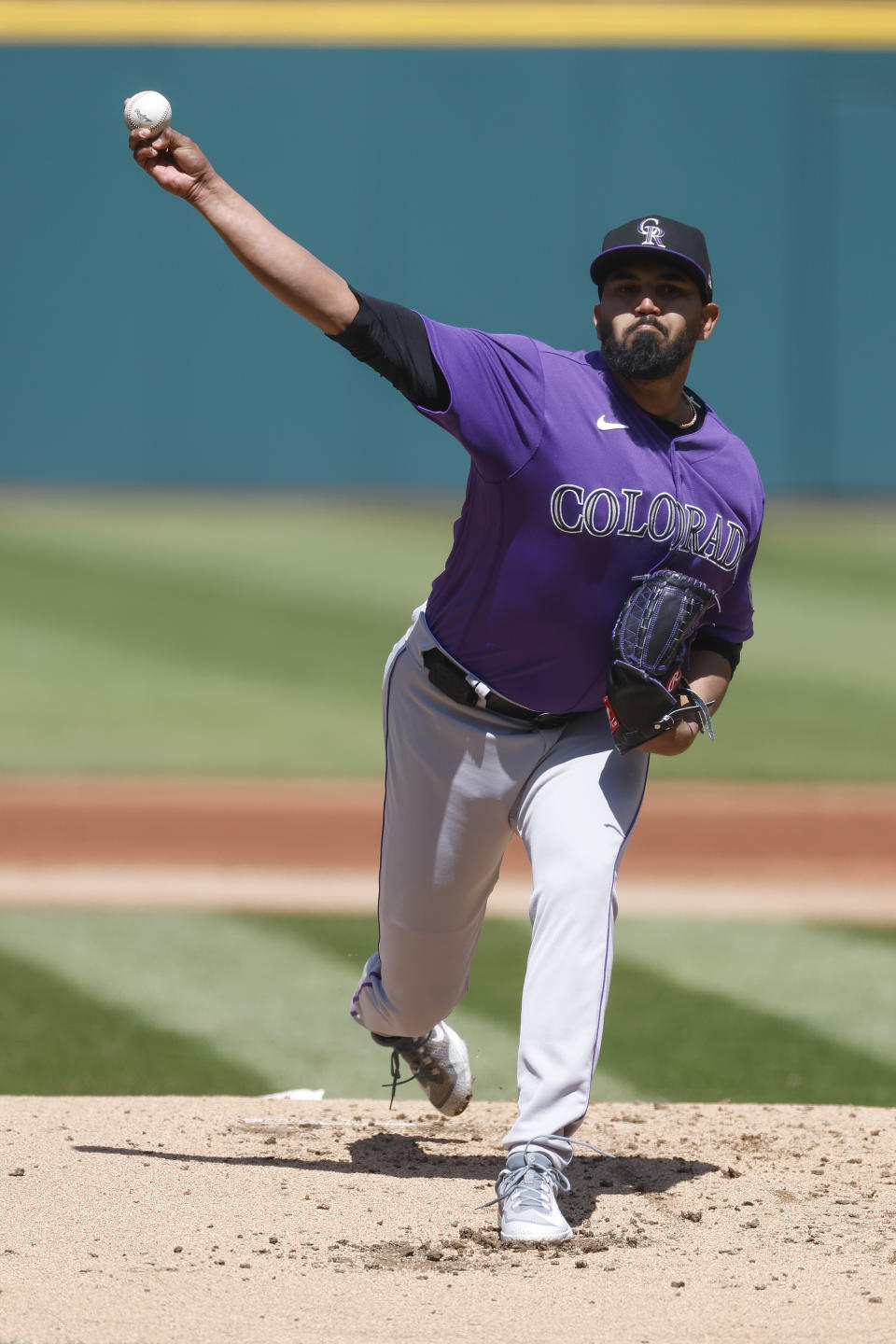 Colorado Rockies starting pitcher German Marquez delivers against the Cleveland Guardians during the first inning of a baseball game, Wednesday, April 26, 2023, in Cleveland. (AP Photo/Ron Schwane)