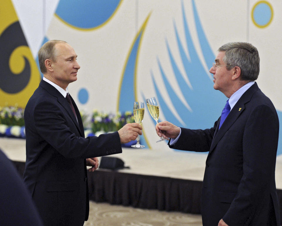 Russian president Vladimir Putin, who received the gold Olympic Order in 2001, forged a close relationship with IOC president Thomas Bach during the build-up to the 2014 Winter Games in Sochi (Reuters via Beat Media Group subscription)