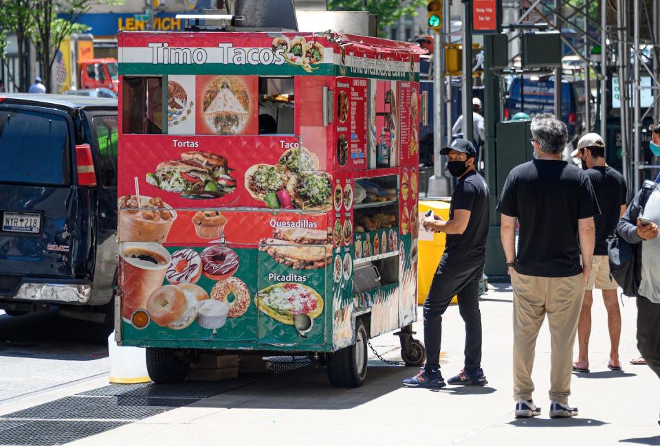 Immigrant food often gains popularity before becoming prestigious as an immigrant community becomes enmeshed in a country’s culture. <a href="https://www.gettyimages.com/detail/news-photo/people-wearing-face-masks-stand-in-line-outside-timo-tacos-news-photo/1260768765?adppopup=true" rel="nofollow noopener" target="_blank" data-ylk="slk:Noam Galai/Moment via Getty Images;elm:context_link;itc:0;sec:content-canvas" class="link ">Noam Galai/Moment via Getty Images</a>