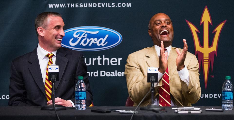 Ray Anderson (right) laughs during a news conference to introduce Bobby Hurley in Tempe on April 10, 2015.