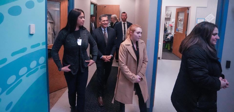 U.S. Department of Health and Human Services Secretary Xavier Becerra, middle, tours the Cudahy Health Department on Friday to mark the 50th anniversary of the Supreme Court's Roe v. Wade decision.