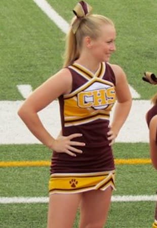 Countryside cheerleader Jenna Fraser in her uniform that is banned during the school day — Doug Fraser photo