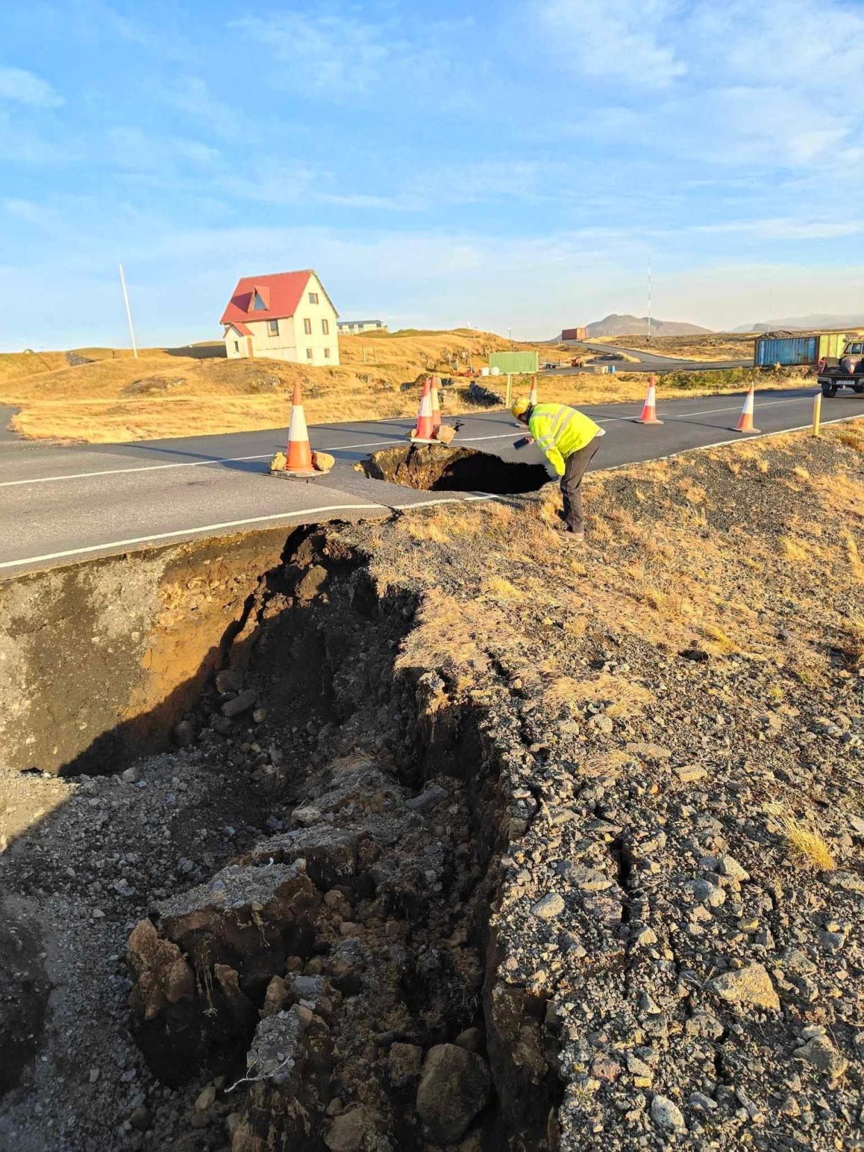 A view of cracks, emerged on a road due to volcanic activity, near Grindavik (Reuters)