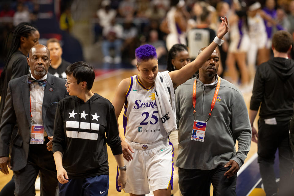 Layshia Clarendon gestures to the Washington crowd after being ejected against the Mystics on Sunday. (Charles Brock/Icon Sportswire via Getty Images)