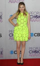 <b>Best dressed: Chloe Grace Moretz</b><br><br>The Kick-Ass actress was on-trend in a neon floral Simone Rocha SS13 dress teamed with simple black heels.<br><br>Image © Rex