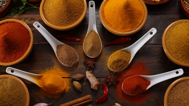 assorted spices in spoons