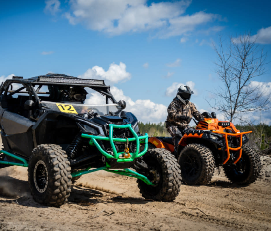 Both SXSs and ATVs provide ample fun in the dirt. The better choice depends on your specific wants, needs, and budget. <p>Getty</p>